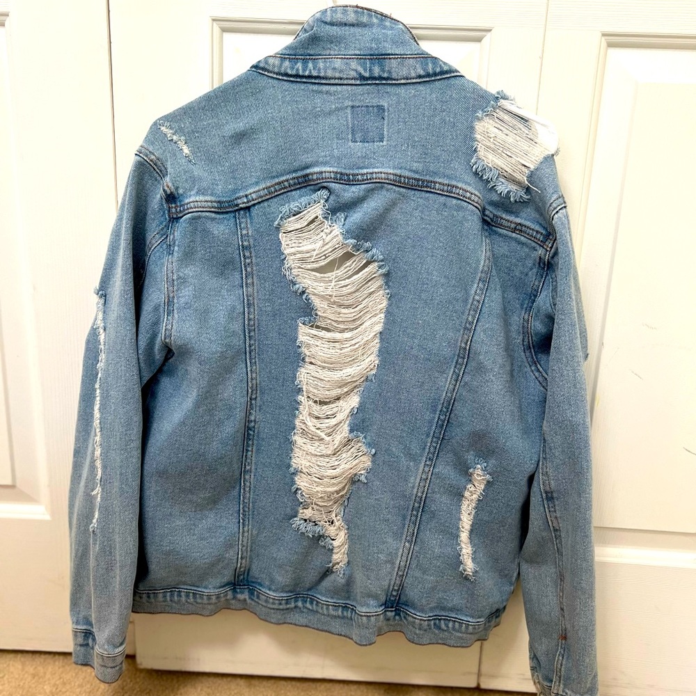 Distressed denim jacket
